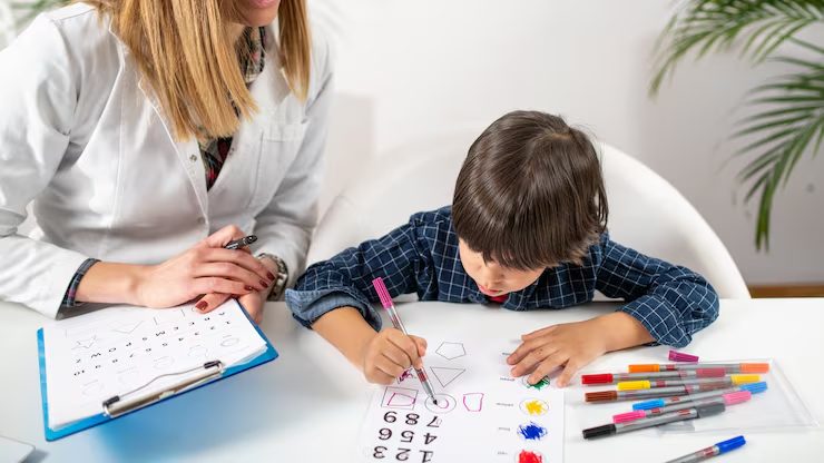 Child taking part in a learning and psychological assessment in Kerala